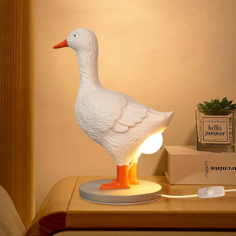 Egg-laying duck lamp by Ammonite