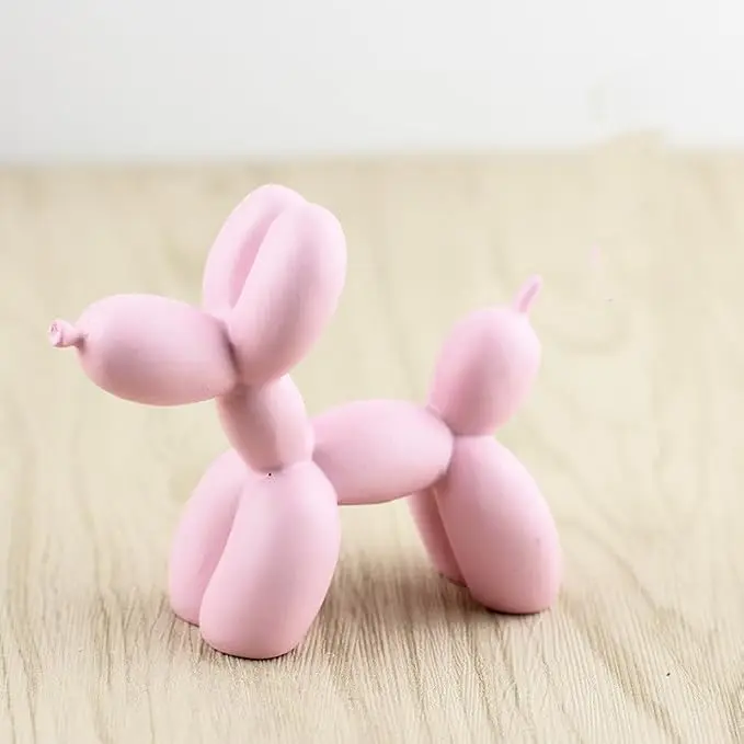 Pink balloon dog sculpture by Addzoe