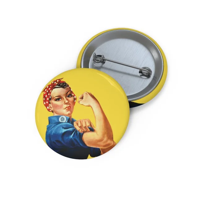 Round yellow pin button showing Rosie the Riveter flexing her arm